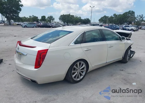 2014 Cadillac Xts Luxury z USA, uszkodzony, nr VIN 2G61M5S30E9195630